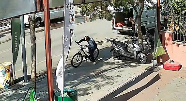 Çaldığı bisikletten düşme tehlikesi geçirdi; o anlar kamerada