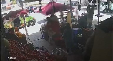 İstanbul - Büyükçekmece'de şiddetli rüzgar manavın şemsiyelerini uçurdu