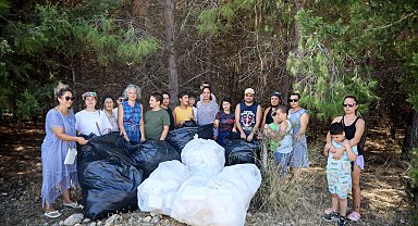 Otizmli çocuklardan yangına karşı orman temizliği