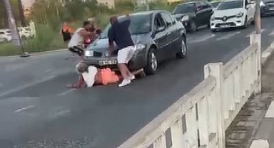 Otomobiliyle, çarptığı kadının üzerinden geçip kaçmaya çalıştı