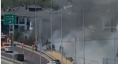 Otoyol kenarındaki ot yangını büyümeden söndürüldü