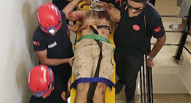 Havalandırma boşluğuna düşen boyacıyı itfaiye kurtardı