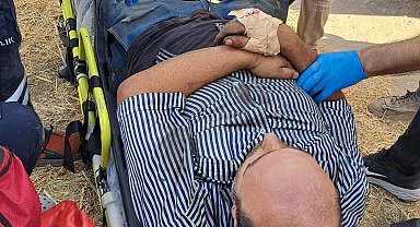 Yem karma makinesine düşen işçiyi itfaiye kurtardı