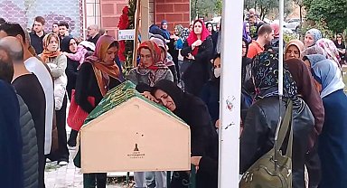 Silodaki patlamada ölen eşinin tabutuna sarılarak ağladı