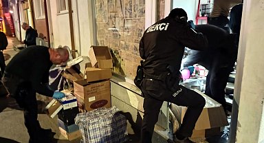 'Kadına şiddet' ihbarına giden polis, 3 milyon liralık kaçak ürün ele geçirdi; 2 gözaltı