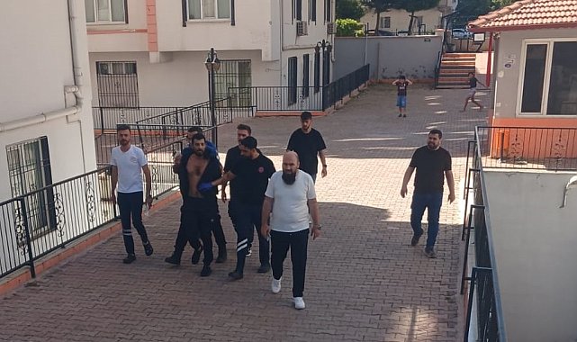 Hamile eşi ile üvey çocuklarını darbetti