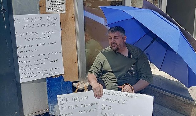 Evden çıkarılan kalp hastası kiracıdan 'Benim kalbim hasta, senin vicdanın' yazılı pankartla eylem