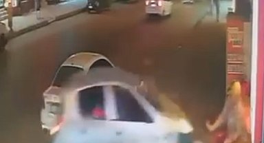 İş yerinin duvarına çarpan otomobilin altında kalmaktan kıl payı kurtuldu