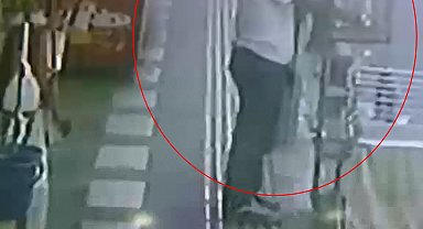 İş yerinin önünden papağanı çaldılar; o anlar kamerada