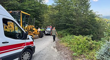 Uçuruma yuvarlanan iş makinesinin operatörü yaralandı