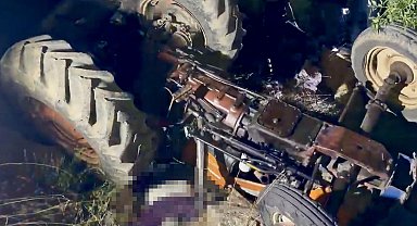 Dere yatağına devrilen traktördeki çift, yaşamını yitirdi