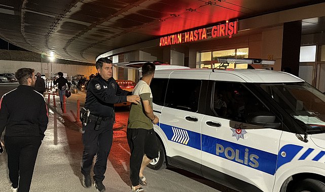Eşi tarafından zorla tutulduğu araçtan atlayınca ağır yaralandı