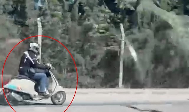 Motosikletiyle ters yönde ilerleyip trafiği tehlikeye attığı anlar kamerada