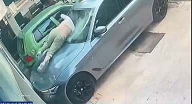Otelin 6'ncı katından otomobilin üzerine düşen kadın ağır yaralandı